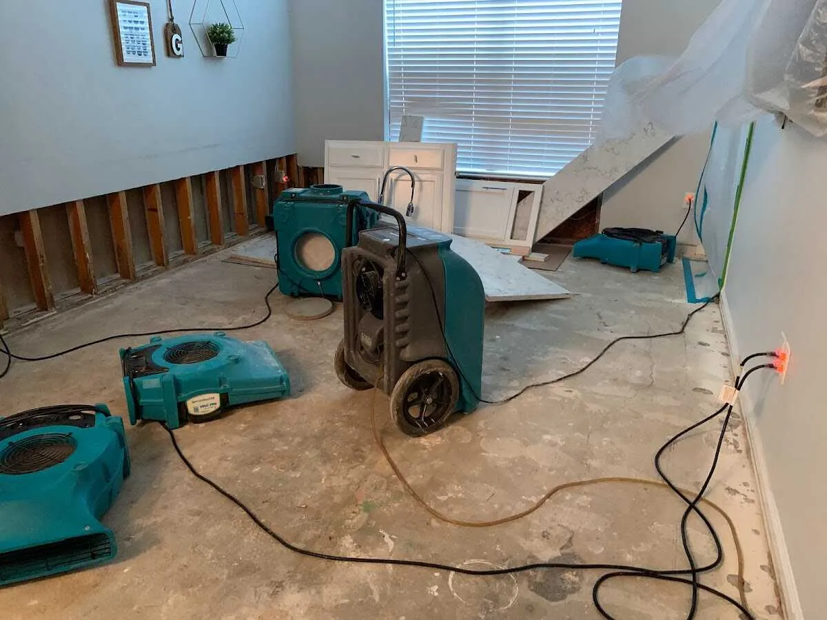 Dehumidifier in flood-cut room for Water Damage Restoration in Jackson